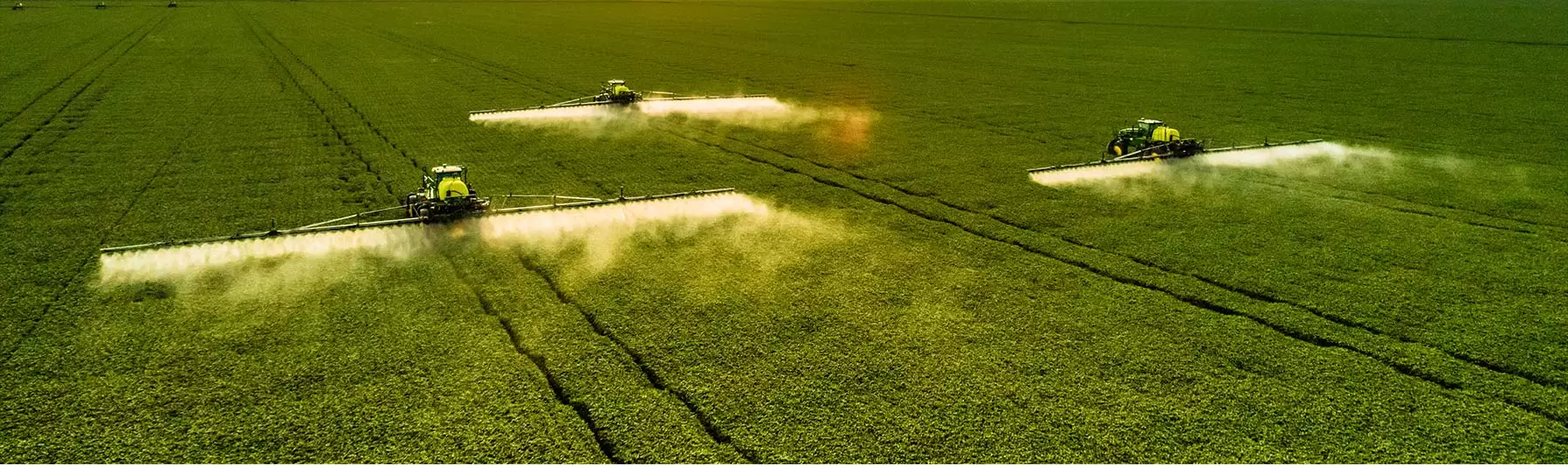 tractor harvesting crops